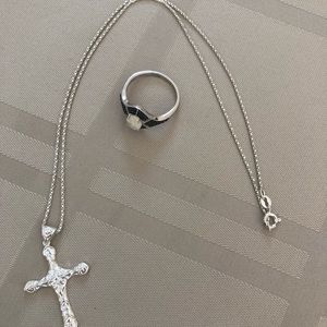 Silver chain with cross pendant and a ring